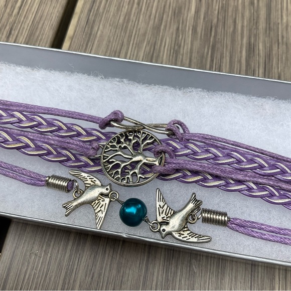 braided bracelet with variety of charms - Picture 2 of 2